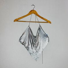 Never Worn Fits Like A A Small Medium Sexy Metallic Chain Top, Women Backless Crop Outfit Sparkly Party Club Night Sequin Halter Top For Summer Party, Summer Party Sequined Halter Top, Backless Crop Top For Party, Silver Crop Top For Summer Party, Silver Halter Top For Summer Evenings, Silver Halter Top For Evening, Glamorous Triangle Halter Top For Parties, Backless Crop Top For Party Season, Elegant Silver Crop Top For Party