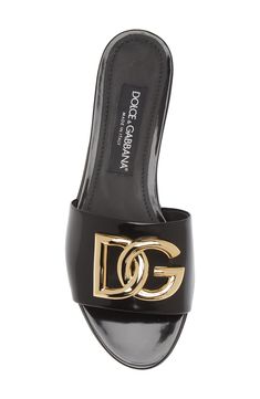 Bold, interlocking logos help bridge the top strap of this overtly Italian slide sandal crafted from glossy patent leather. Leather upper, lining and sole Made in Italy Designer Shoes Black Designer Sandals, Red Bottom Heels Christian Louboutin, Dolce And Gabbana Shoes, Designer Slides Women, Sandals Design, Designer Shoes Women, Shoes Dolce Gabbana, Red Bottom Heels, Luxury Sandals