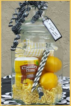 a glass jar filled with lemons and other items