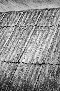 a black and white photo of the roof of a building