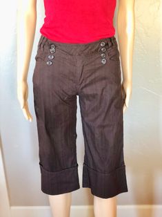 "These Vintage My Michelle, Size woman's Small, cuffed Crop Pants, brown small size crop pants are super tiny, they say they are a size 16 and are made in China, but please see measurements, I'm guessing a size 2-5 in US.  They are super adorable pants and in perfect vintage condition except the inside button appears to have been repaired.  These capri pants will make a perfect addition to your wardrobe, they look adorable with a tank top, or dressed up as well.  So many options.  Awesome Vintag Brown Cropped Leg Bottoms For Spring, Brown Cropped Leg Pants With Pockets, Brown Cropped Pants With Pockets, Brown Cropped Leg Pants For Spring, Mid Waist Pants, Brown Trousers, Cropped Pants Women, Casual Bottoms, Pants Brown