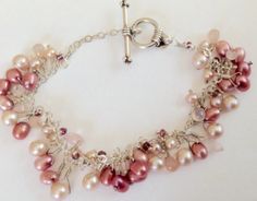 Pearl Bracelet Pink pearl and crystal by KarynJamieDesigns on Etsy Adjustable Pink Pearl Bracelet With Pearl Drop, Elegant Beaded Dangle Charm Bracelet, Pink Dangle Pearl Chain Jewelry, Pink Pearl Drop Bracelet For Wedding, Pink Pearl Bracelet With Pearl Drop, Elegant Pink Charm Bracelet With Round Beads, Pink Pearl Bracelet For Party, Elegant Pink Bracelets With Pearl Chain, Pink Elegant Charm Bracelet