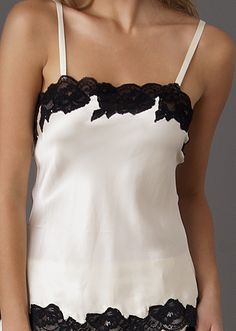 because it would look beautiful under a casual blazer Chic Silk Camisole With Lace Trim, Chic Camisole With Contrast Lace, White Elegant Tops With Contrast Lace, Elegant White Tops With Contrast Lace, Chic Lace Top Camisole For Daywear, Chic Tops With Contrast Lace, Chic Evening Camisole With Lace Top, Chic Silk Top With Delicate Lace, Chic Delicate Lace Camisole