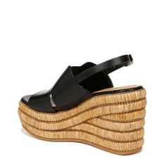 Step up your style game with a touch of class and sophistication wearing the Franco Sarto® Tamryn Slingback Espadrille Wedge Sandals. The square toe pair features synthetic upper construction with braided wedge heel detail and buckled slingback strap closure..Eco-conscious linings with soft + sustainable comfort and cushioned footbed..Peep toe silhouette..Synthetic outsole..Imported..Product measurements were taken using size 7, width M. Please note that measurements may vary by size..Measurements: Heel Height: 4 3/10 in Synthetic Slingback Wedge Sandals For Vacation, Leather Wedge Sandals With Braided Straps For Spring, Synthetic Wedge Heel Slingback Sandals, Chic Synthetic Slingback Wedge Sandals, Chic Wedge Sandals With Braided Straps, Synthetic Slingback Wedge Sandals With Heel Strap, Casual Leather Wedge Sandals With Braided Straps, Spring Woven Leather Wedge Sandals, Spring Synthetic Woven Leather Wedge Sandals