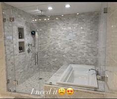 a bath tub sitting inside of a bathroom next to a walk in shower