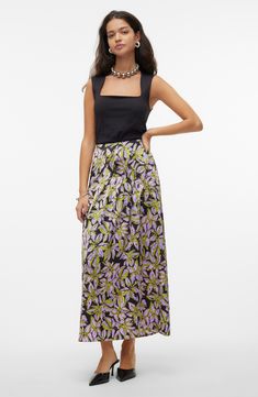 Delightful blooms romance this lightly draped skirt designed with a layered, asymmetric hem. 37" length (size Medium) Lined 51% recycled polyester, 49% polyester Machine wash, line dry Imported Spring Silk A-line Maxi Skirt, Spring Tiered Viscose Maxi Skirt, Spring Viscose Long Maxi Skirt, Silk Floral Print Flowy Maxi Skirt, Floral Print Flowy Evening Skirt, Evening Flowy Floral Print Skirt, Evening Floral Print Flowy Skirt, Flowy Floral Print Evening Skirt, Elegant Printed Summer Skirt