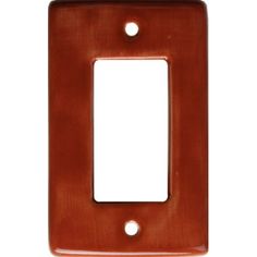 a light switch cover with an orange finish