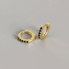 14k Yellow Gold & Black Cz Paved Huggie Hoop Earrings Price Is For 1 Pair (2 Pieces) Stone(S) Details: Stones: 11 Cz Gemstones Each (22 In Total) Stone Type: Cubic Zirconium Stone Color: Black Stone Shape: Round Stone Size: 1.5mm (Each) Stone Setting: Hand-Set Metal Details: Metal Type: Sterling Silver Metal Color: Yellow Gold Metal Finish: Beautifully Polished Karat: 14k Earring Design Details: Earring Style: Huggie Hoop Earring Back: Hinged Inner Diameter: 7mm Outer Diameter: 10mm