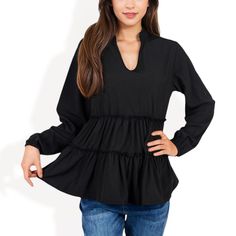 The Anna-Kaci Women's Long Sleeve Tiered Babydoll Blouse is a charming addition to your casual wardrobe. Featuring a flattering V-neckline, this blouse is designed with tiered layers that create a playful, flowy silhouette. The long sleeves with elastic cuffs add a touch of elegance while providing comfort and ease of movement. Perfect for pairing with jeans or leggings, this babydoll blouse is ideal for a casual day out, offering both style and comfort in one effortless piece. Babydoll Blouse, Bishop Sleeve, Satin Shirt, Boyfriend Fit, Shop Blouses, Casual Fits, Short Sleeve Blouse, Casual Wardrobe, Trending Shirts