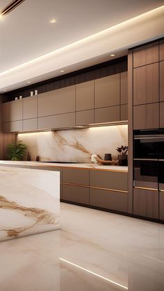 a modern kitchen with marble counter tops and cabinets