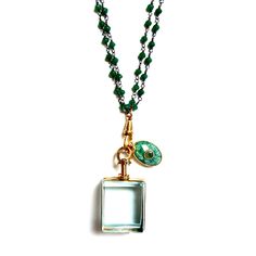 Handcrafted one-of-a-kind necklace, vintage square glass locket pendant on a doubled green onyx dainty chain, an oval green agate pendant, a vintage charm holder and a vintage magnetic clasp. Wear it long or doubled over short. Dress it up or down, chic timeless classic and super stylish! The Necklace measures 30" in length Green onyx chain Vintage pendant Vintage magnetic brass clasp Made with love in Los Angeles Complimentary gift wrapping provided All sales final. Luxury Green Locket Necklaces, Luxury Green Locket Necklace, Green Necklace Locket, Luxury Vintage Square Pendant Necklace, Luxury Vintage Necklace With Rectangular Pendant, Glass Locket Pendant, Jewelry Styling, Charm Holder, Glass Locket