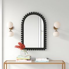 This accent mirror adds a bold yet playful touch to your living room or hallway with its crowned shape and beaded accents. It's crafted from wood with a classic black finish that's ready to work in your space. At nearly 35'' long, this mirror is an ideal centerpiece on your mantel or gallery wall. Plus, it looks great above a bedroom dresser or entryway table for one last outfit check as you walk out the door. | Joss & Main Waltham Wood Frame Wall Mounted Mirror in Black/Brown | Size 22.8 H x 35 Long Mirror, Beaded Mirror, Wood Arch, Arched Mirror, Unique Mirrors, Arch Mirror, Wood Wall Mirror, Mirror Wall Art, Mirrors Wayfair