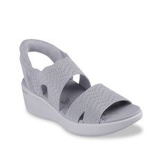 Skechers-Hands Free Slip-Ins Pier-Lite Sandal Enjoy summery days in the Skechers Hands Free Slip-Ins® Pier-Lite sandal. Designed with an exclusive Heel Pillow™ that cushions and allows for an easy slip-on fit, this sandal features a knitted upper and a cushioned footbed for additional comfort. Comfortable Gray Sandals For Summer, Gray Sandals For Summer Vacation, Gray Sandals With Arch Support, Hands Free, Slip On, Cushions, Sandals, Heels