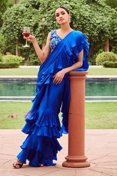 Shop for GG by Asha Gautam Blue Satin Georgette Ruffle Pre-draped Saree With Blouse for Women Online at Aza Fashions Saree Ruffle, Bhumika Sharma, Skirt Saree, Draped Saree, Ruffle Saree, Drape Saree, Draped Blouse, Brown Blouse, Blue Saree