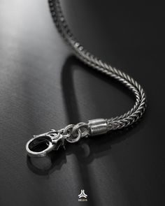 Material: Silver S925 Brand: HELIOS GLOBAL Specific: 3 sizes with length 50cm, 55cm, 60cm The same brother to the Eden x Wave Silver Necklace, this Eden x Lotus does not use a silver wave-shaped buckle, but it owns the signature symbol of Helios - Lotus. + Helios Global - a handcrafted jewelry brand manufactured and designed by the most skilled jewelers.+ All of our jewelry products come with a lifetime warranty. Note: Custom Printed Packaging Box - Style and Personality - Only at Helios Global Sterling Silver Snake Chain Jewelry With Polished Finish, Sterling Silver Jewelry With Polished Snake Chain, Silver Polished Snake Chain Jewelry, Silver Jewelry With Oval Link Box Chain, Polished Silver Snake Chain Jewelry, Silver Spiritual Snake Chain Jewelry, Spiritual Silver Snake Chain Jewelry, Silver Link Engraved Jewelry, Silver Link Jewelry With Engraving