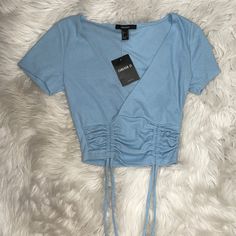 Brand New Tags On Cropped V Neck Sky Blue Adjustable Strings Ruched Detail Forever 21 V-neck Crop Top For Spring, Light Blue V-neck Casual Crop Top, Casual Light Blue V-neck Crop Top, Trendy Blue Crop Top For Day Out, Blue Casual Crop Top For Night Out, Casual Blue Crop Top For Night Out, Trendy Light Blue Tops For Night Out, Trendy Light Blue Top For Night Out, Forever 21 Trendy V-neck Crop Top