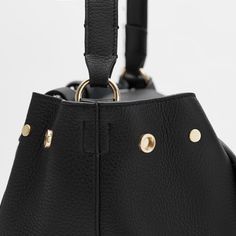 Designed to move. A trusted classic for on-the-go comfort. Small Leather Accessories, Leather Industry, Black Leather Backpack, Backpack Travel Bag, Zippered Tote, Small Pouches, Monogrammed Items, Zip Wallet, Mini Tote