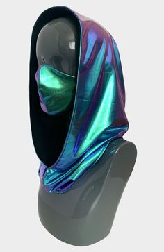 Unleash your Spiritual Ninja in our Aura Festival Hood and Mask! We've designed our reversible hoods with a gorgeous blue and purple shifting holographic fabric, and on the reverse side we use a solid black fabric made from sustainably harvested eucalyptus trees. Our hoods are reversible and can easily slip over your head. They are unisex one size fits all! Our adjustable Aura masks are also lined with our eucalyptus fabric making them soft to the touch. * Handmade in California * Made from Scra Purple Ninja Outfit, Galaxy Theme Outfit, Rave Outfits Black, Rave Hood, Spider Oc, Holographic Rave Outfit, Futuristic Outfits, Material Gworl, Face Gear