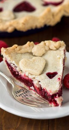 a slice of raspberry pie on a white plate with the title overlay reads, the best recipe for raspberry pie