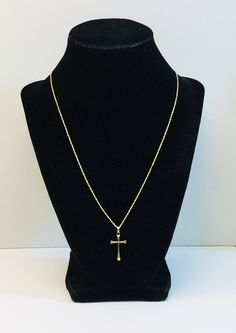 "The past will always return in the fashion world and this piece is back for round two! In the 1920's ladies of class wore the most opulent dresses with jewelry to match. As the years continued, jewelry makers tailored pieces to fashion and trends which resulted in affordability for style. Presenting this fantastic Vintage 14k Yellow Gold Chain Neckless With Gothic Inspired Cross Pendant Featuring Elegant Timeless Designs. Approximate Size: Chain is 22.00\" Long, Cross measures 26 mm by 13 mm Ov Classic Evening Necklace With Diamond Cut, Classic Evening Pendant Jewelry, Gold Hallmarked Necklaces For Evening, Classic Chain Necklace With Pendant For Formal Occasions, Classic Pendant Chain Necklace For Formal Occasions, Classic Gold-tone Necklace For Formal Occasions, Classic Formal Pendant Chain Necklace, Gold Cross Chain Necklace Elegant Style, Elegant Gold Cross Chain Necklace