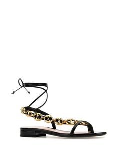 Find GUCCI Marina Chain Sandals on Editorialist. black leather smooth grain tie-fastening ankle strap chain-link detailing multi-way straps round open toe branded footbed flat rubber sole We've partnered with Good On You — an independent agency that rates how brands perform in relation to their impact on the planet, people and animals, with a multi-criteria rating simplified to a five points scale. In order to be awarded our conscious label, larger brands need to score a minimum of four out of five ('Good'), while smaller brands must score at least three out of five ('It's A Start'). This item comes from a brand rated three out of five ('It's A Start') by Good on You at the time it was added on FARFETCH. Please note, this is a brand-level rating and does not guarantee that this product is Chain Sandals, Chanel 2, Iconic Bags, Demi Fine Jewelry, Summer Beach Wear, Sandals Black, Fine Earrings, Ballet Flat Shoes, Pump Sandals