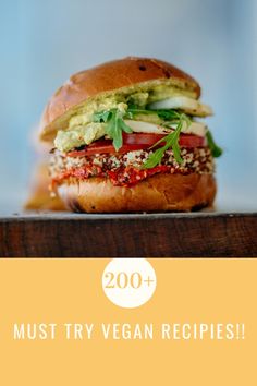 a very tasty looking veggie sandwich with the words 200 must try vegan recipes