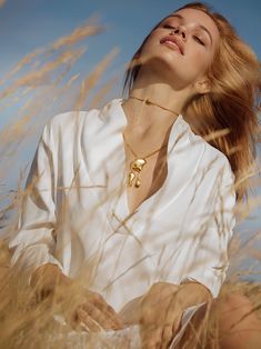 MISHO's Pebble Drop necklaces featured in Vogue Italia. '...a restless wind swallowed the cliffs and parted the clouds just enough for a a flare of sunlight; it flashed off the white shore and for a moment the world was golden.' ﻿For our SS/19 collection, we returned to the landscape that played our muse. Handcrafted in sterling silver the collection draws inspiration from the forms, colours and light that are forever trapped between land and sea. The set of two necklaces, one a tight choker, th Gold Link Chain Necklace, Female Photography, Drop Necklaces, Jewellery Photography Inspiration, Nature Goddess, Knitted Necklace, Jewelry Photography Styling, Two Necklaces, Jewelry Photoshoot