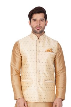 Vastramay brings to you this Stylish yet Comfortable Men Gold Men Woven Jari Jaquard Blended Cotton Modi Jacket. Adorn it for a perfect Classy and Trendy look. Pair it with a juti or a mojari for the Royal look. Product Features : Top Color: Gold Top Fabric: Cotton Blend Lining Material: Cotton Satin Product Type: Modi Nehru Jacket Hemline: Straight Fabric Purity: Blended Weave Pattern: Jacquard Placket: Button Placket Collar: Mandarin Collar Sleeves: Sleeveless Nehru Jacket For Men, Christmas Father, Nehru Jacket, Man Weave, Woven Jacket, Nehru Jackets, Mens Wear, Ethnic Dress, Woven Top