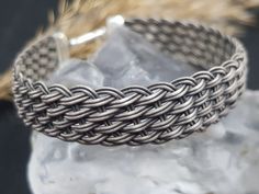 999 Sterling Silver Weave Vikings Bracelet For Men And Women. Our original 1000 Sterling silver Bracelet with %100 handmade is the art of Kazaziye. is specially produced for you. This oxidized handmade wide cuff bracelet is braided from 999k pure silver through a special technique. First we make threads from silver and then we knit them ONE by ONE on hand by using ancient Lydian techniques. Timeless jewelry gift for him. There is nothing you need to be careful while using. Boho style bracelet wi Mens Cuff Bracelets, Boho Style Bracelets, Bracelets With Meaning, Mens Cuff, Silver Chain For Men, Viking Bracelet, Wide Cuff Bracelets, Silver Chain Style, Mens Anniversary Gifts