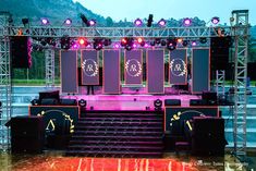 an outdoor stage set up with lights and sound equipment for a party or concert event