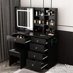 a black vanity with drawers and a mirror