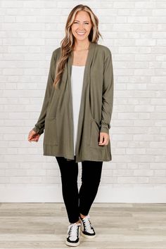 We are simply in love with this beautiful cardi! This gorgeous, light olive cardigan features figure-flattering fit, lightweight fabric, and functional pockets that you'll adore! The perfect layering piece for the season, it's sure to become a staple in any wardrobe! 57% Polyester, 38% Rayon, 5% Spandex Lightweight Long Sleeve Winter Cardigan, Green Soft Knit Cardigan For Layering, Lightweight Open Front Outerwear For Fall, Solid Color Lightweight Long Sleeve Cardigan, Solid Lightweight Long Sleeve Cardigan, Lightweight Cardigan For Layering In Fall, Lightweight Long Sleeve Solid Color Cardigan, Lightweight Fall Cardigan For Layering, Lightweight Cardigan For Fall Layering