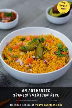 an authentic spanish / mexican rice dish served in a white bowl