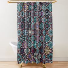 a colorful shower curtain with an abstract design on the front and back panels in blue, green, purple and red colors