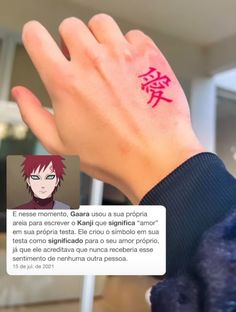 someone is holding their hand up with the word gon naruta written on it