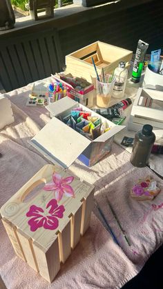 an assortment of crafting supplies on a table