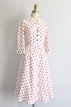 "Vintage 1950s cotton sundress. White with red polka dot print. V collar, darted bust and fold over long sleeves . Faux pockets in back. Nipped waist followed by a full skirt. Front button closure. State of garment | good, light overall wear and faint yellowing underarms, the inner collar and near hemline. Measurements ✂--- best fit | extra small bust | up to 37 \" shoulders | 15 \" shoulder to waist | 14\" sleeves | 16\" waist | 24 - snug 25\" hips | free total length (shoulder to hem) | 42 \" Polka Dot Long Sleeve Cotton Dress, Long Sleeve Polka Dot Cotton Dress, Vintage Polka Dot Long Sleeve Dresses, Vintage Long Sleeve Polka Dot Dress, Retro Polka Dot Dress For Daywear, Retro Polka Dot Day Dresses, Vintage Polka Dot Dress For Daywear, Sundress White, Julie Miller