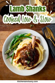 lamb shanks cooked low and slow on top of mashed potatoes with gravy