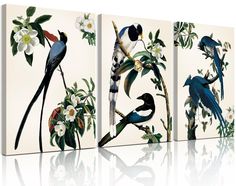 three canvases with birds on them and flowers in the bottom one is white, the other is blue