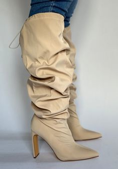 Our Slouch chunky heel boot features canvas material and a chunky heel. This boot is very versatile and can be worn up the leg or gathered around the calf. Details: Slouchy mid-calf height shaft, pull on fit, pointed toe Heel Height: approx 4" True fit for most Chic Beige Knee-high Boots With Pointed Toe, Fitted Cream Knee-high Heeled Boots, Fitted Cream Knee-high Boots For Fall, Beige Knee-high Heeled Boots For Party, Trendy Beige Knee-high Boots For Fall, Chic Beige Knee-high Heeled Boots, Chic Beige Wide Calf Knee-high Boots, Chic Cream Knee-high Boots With Pointed Toe, Chic Cream Pointed Toe Knee-high Boots