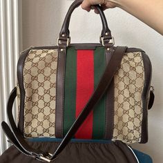 This Gucci Handbag Is Gorgeous And In Like New Condition! Brown Beige Canvas And Leather On The Exterior And Features The Signature Vintage Web Stripe Detailing In The Center. This Handbag Has Dual Handles, Gold Toned Hardware, And A Spacious Canvas Lined Interior. Straps Included, Never Used. Boston Bag. Great Travel Bag Dust Bag Has Matching Gucci Wedge Sandals. On My Closet. Please Look. Handles Minor Discolored (Edges Of Bag) No Rips, Or Tears. See Photo. Final Sale. Base Length: 12.75" Heig Gucci Boston Bag, Y2k Early 2000s, Bag Y2k, Gucci Handbag, Boston Bag, Gucci Handbags, Early 2000s, Brown Beige, Gucci Bag