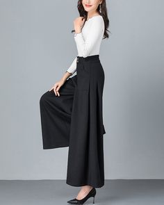 * A cool wide leg skirt pants, made of quality cotton blends. * Two pockets, they are big enough for your hands. * Fixed waist on front and elastic waist on back. * Material: 6% cotton, 90% polyester, 4% spandex * Let us know your usual size in your country and your overall height. * Can custom make waist size and length. * Size: True to US size, US 0-US 20 are available, you can let us know your usual size and height in your order. * Shipping: Free shipping Processing time : 5-7 Business days D Chic Ankle-length Cotton Culottes For Fall, Black Cotton Wide Leg Culottes, Black Wide Leg Cotton Culottes, Cotton Wide Leg Culottes For Fall, Fall Cotton Wide-leg Culottes, High-waist Baggy Cotton Culottes, Baggy High-waist Cotton Culottes, Baggy Cotton High Waist Culottes, Cotton Culottes With Pockets For Fall