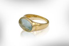 "Large Aquamarine Gemstone Ring, Bohemian 9K Gold statement March birthstone Ring, This ring is a part of my \"Gemstone Jewelry collection\", its a very impressive ring, made of 9K solid gold with a large and special blue color Aquamarine stone, this is a ring you cannot ignore. It is Elegant and Bold and has a timeless chic. Features: * Handmade * 9K solid gold - Yellow / Rose - please write in your order. * Aquamarine gemstone- natural 14/10 mm * Size : all sizes * The Aquamarine stone can be Women March, Filigree Wedding Ring, March Birthstone Ring, Buying An Engagement Ring, Custom Wedding Rings, Gold Gemstone Ring, Aquamarine Ring, Statement Ring Silver, March Birthstone