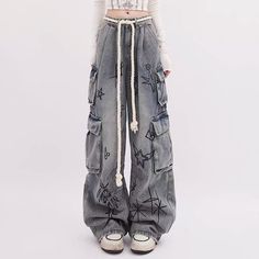 Casual Baggy Distressed Cargo Pants, Grunge Denim Blue Cargo Jeans, High Waist Grunge Cargo Jeans For Streetwear, Grunge Denim Cargo Pants For Streetwear, High Waist Cargo Jeans In Grunge Style, Grunge Denim Blue Pants For Streetwear, Baggy High-waist Distressed Cargo Jeans, High Waist Cargo Jeans For Hip Hop Streetwear, Baggy Grunge Jeans With Cargo Pockets