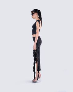 Let your sultry side shine in this sexy all-black fit 🖤 Featuring a black backless top, paired with a black ruffled maxi skirt for a look that will have you turning heads and taking names 🤤 Elegant Black Ruched Maxi Skirt, Black Ruched Maxi Skirt For Summer, Ruched Maxi Skirt For Summer Evenings, Chic Ruched Maxi Skirt For Evening, Chic Ruched Maxi Skirt For Party, Chic Party Maxi Skirt With Ruched Details, Black Ruched Maxi Skirt For Evening, Glamorous Evening Maxi Skirt For Summer, Black Fitted Ruched Maxi Skirt