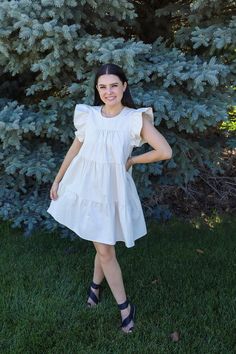 This dress could not be more perfect for summer. We love a neutral dress around here that pairs with absolutely everything! You would not believe the quality of this dress. I wish you could reach through the screen and feel it right now. Just take my word for it. Unreal ruffle sleeves with the cutest tiers AND pockets. Running true to size. Malorie is 5'6" and wearing a size medium. Neutral Dress, Head In The Clouds, Trend Report, In The Clouds, Ruffle Sleeves, Feel It, 50's Dress, The Clouds, Love A