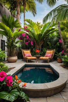 an outdoor pool surrounded by tropical plants and flowers, with two lounge chairs in the middle