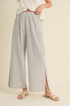 DescriptionThe Seaside Striped Linen Pants feature: Raw edge Side pockets Side slits Wide leg Elastic waistband FitRelaxed, true to size MaterialLinen / Cotton Striped Linen Pants, Unisex Clothes, Linen Pant, Wide Leg Linen Pants, Striped Linen, Linen Pants, Granada, Raw Edge, Hat Hairstyles