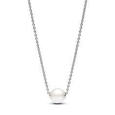 Elevate your style with our Treated Freshwater Cultured Pearl Collier Necklace from our Pandora Timeless collection. This sterling silver piece features an adjustable cable chain with a luminous treated freshwater cultured pearl pendant. A clear cubic zirconia by the clasp adds a touch of sparkle. This necklace represents the fusion of classic and contemporary, making it a perfect choice for both casual and special occasions. Please note that each treated freshwater cultured pearl is unique and can vary in size and colour; normal wear and tear may occur with this material. Our freshwater cultured pearls are treated with bleaching and lustre enhancement. White Classic Pearl Necklace With Cable Chain, Engagement Rings Bridal Sets, Bridal Ring Sets, Heart Chain, Freshwater Cultured Pearls, Silver Pieces, Diy Charms, Metal Necklaces, Pandora Jewelry