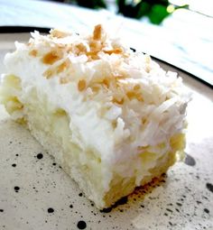 a piece of coconut cake on a plate